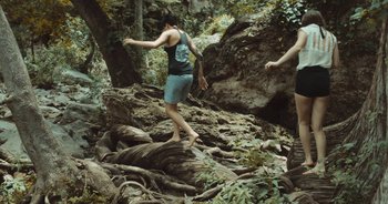 Movie still from “Alt-J - Left Hand Free” (2014), directed by Ryan Staake – Wide shot, High angle