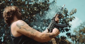 Movie still from “Alt-J - Left Hand Free” (2014), directed by Ryan Staake – Medium shot, Low angle