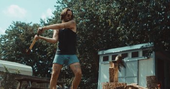 Movie still from “Alt-J - Left Hand Free” (2014), directed by Ryan Staake – Medium shot, Low angle