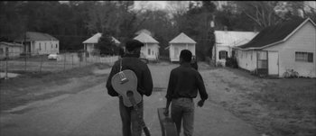 Movie still from “Paul McCartney - Early Days” (2014), directed by Vincent Haycock – Wide shot, Low angle