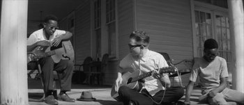 Movie still from “Paul McCartney - Early Days” (2014), directed by Vincent Haycock – Medium shot, Low angle