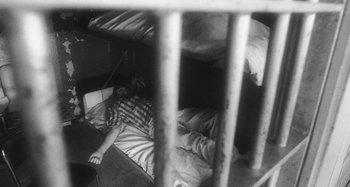 Movie still from “Timber Timbre - Curtains?!” (2014), directed by Tyler T. Williams – Wide shot, Overhead angle