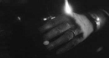 Movie still from “Timber Timbre - Curtains?!” (2014), directed by Tyler T. Williams – Extreme Close Up shot, High angle
