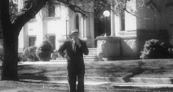 Movie still from “Timber Timbre - Curtains?!” (2014), directed by Tyler T. Williams – Wide shot, Low angle