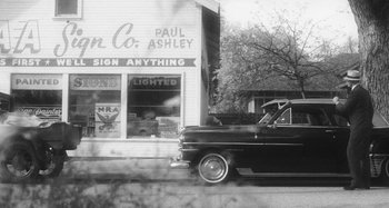 Movie still from “Timber Timbre - Curtains?!” (2014), directed by Tyler T. Williams – Wide shot, Low angle