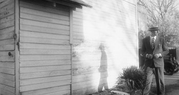 Movie still from “Timber Timbre - Curtains?!” (2014), directed by Tyler T. Williams – Wide shot, Low angle