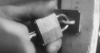 Movie still from “Timber Timbre - Curtains?!” (2014), directed by Tyler T. Williams – Extreme Close Up shot, High angle