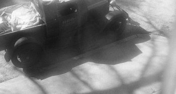 Movie still from “Timber Timbre - Curtains?!” (2014), directed by Tyler T. Williams – Wide shot, High angle