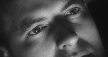 Movie still from “Timber Timbre - Curtains?!” (2014), directed by Tyler T. Williams – Extreme Close Up shot, High angle