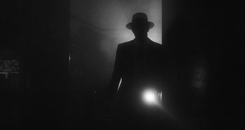 Movie still from “Timber Timbre - Curtains?!” (2014), directed by Tyler T. Williams – Medium shot, Low angle