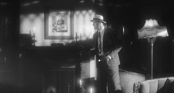 Movie still from “Timber Timbre - Curtains?!” (2014), directed by Tyler T. Williams – Medium shot, Low angle