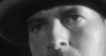 Movie still from “Timber Timbre - Curtains?!” (2014), directed by Tyler T. Williams – Extreme Close Up shot, Low angle