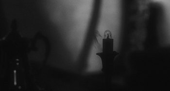 Movie still from “Timber Timbre - Curtains?!” (2014), directed by Tyler T. Williams – Extreme Close Up shot, High angle