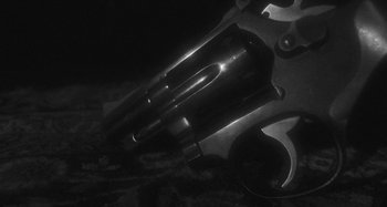 Movie still from “Timber Timbre - Curtains?!” (2014), directed by Tyler T. Williams – Extreme Close Up shot, Overhead angle