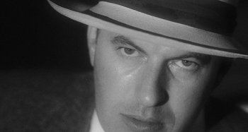 Movie still from “Timber Timbre - Curtains?!” (2014), directed by Tyler T. Williams – Extreme Close Up shot, Low angle
