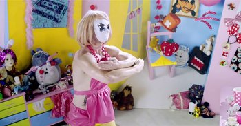 Movie still from “Doprah - Stranger People” (2014), directed by Thunderlips – Medium shot, Low angle
