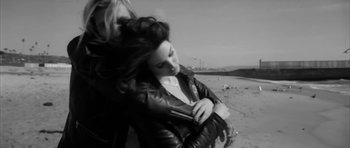 Movie still from “Lana Del Ray - West Coast” (2014), directed by Vincent Haycock – Medium shot, High angle