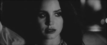 Movie still from “Lana Del Ray - West Coast” (2014), directed by Vincent Haycock – Close Up shot, High angle