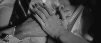 Movie still from “Lana Del Ray - West Coast” (2014), directed by Vincent Haycock – Extreme Close Up shot, Overhead angle