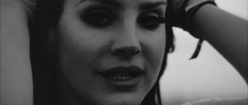 Movie still from “Lana Del Ray - West Coast” (2014), directed by Vincent Haycock – Close Up shot, High angle