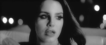 Movie still from “Lana Del Ray - West Coast” (2014), directed by Vincent Haycock – Close Up shot, High angle