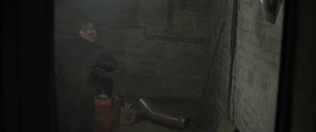 Movie still from “Lyla Foy - Feather Tongue” (2014), directed by Oscar Hudson – Medium shot, High angle