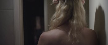 Movie still from “Lyla Foy - Feather Tongue” (2014), directed by Oscar Hudson – Extreme Close Up shot, Over the shoulder angle