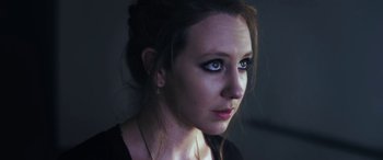 Movie still from “Lyla Foy - Feather Tongue” (2014), directed by Oscar Hudson – Close Up shot, High angle