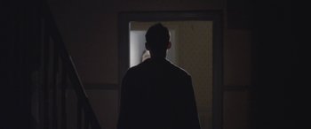 Movie still from “Lyla Foy - Feather Tongue” (2014), directed by Oscar Hudson – Medium shot, Over the shoulder angle