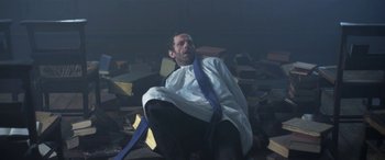 Movie still from “Lyla Foy - Feather Tongue” (2014), directed by Oscar Hudson – Medium shot, Low angle