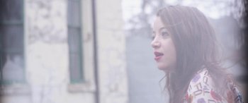 Movie still from “Lyla Foy - Feather Tongue” (2014), directed by Oscar Hudson – Close Up shot, Low angle