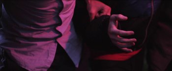 Movie still from “Lyla Foy - Feather Tongue” (2014), directed by Oscar Hudson – Extreme Close Up shot, Overhead angle
