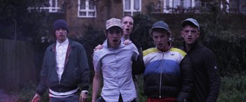 Movie still from “Lyla Foy - Feather Tongue” (2014), directed by Oscar Hudson – Medium shot, Low angle