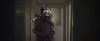 Movie still from “Lyla Foy - Feather Tongue” (2014), directed by Oscar Hudson – Medium shot, Over the shoulder angle