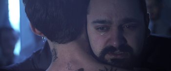 Movie still from “Lyla Foy - Feather Tongue” (2014), directed by Oscar Hudson – Close Up shot, Over the shoulder angle