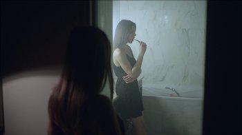 Movie still from “ALB - Whispers” (2014), directed by Casper Balslev – Medium shot, Over the shoulder angle