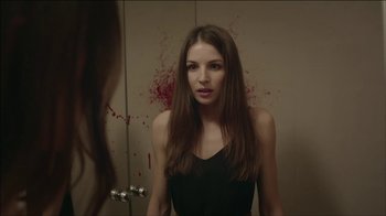 Movie still from “ALB - Whispers” (2014), directed by Casper Balslev – Close Up shot, Over the shoulder angle