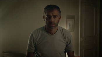 Movie still from “ALB - Whispers” (2014), directed by Casper Balslev – Close Up shot, Low angle