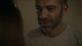 Movie still from “ALB - Whispers” (2014), directed by Casper Balslev – Close Up shot, Over the shoulder angle