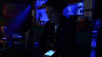 Movie still from “Arctic Monkeys - Why’d You Only Call Me When You’re High?” (2013), directed by Nabil Elderkin – Close Up shot, Low angle