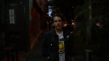 Movie still from “Arctic Monkeys - Why’d You Only Call Me When You’re High?” (2013), directed by Nabil Elderkin – Medium shot, High angle