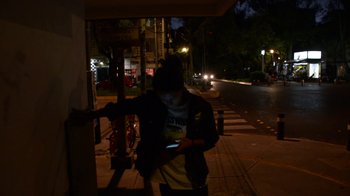 Movie still from “Arctic Monkeys - Why’d You Only Call Me When You’re High?” (2013), directed by Nabil Elderkin – Medium shot, High angle