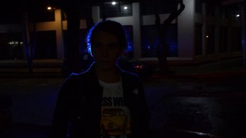 Movie still from “Arctic Monkeys - Why’d You Only Call Me When You’re High?” (2013), directed by Nabil Elderkin – Medium shot, Low angle