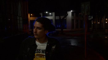 Movie still from “Arctic Monkeys - Why’d You Only Call Me When You’re High?” (2013), directed by Nabil Elderkin – Medium shot, Low angle