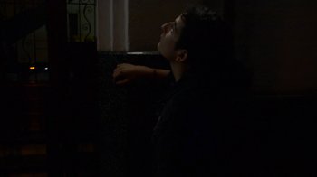 Movie still from “Arctic Monkeys - Why’d You Only Call Me When You’re High?” (2013), directed by Nabil Elderkin – Medium shot, Low angle