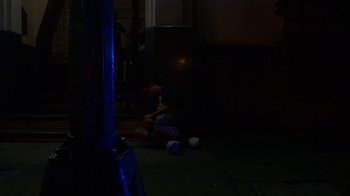 Movie still from “Arctic Monkeys - Why’d You Only Call Me When You’re High?” (2013), directed by Nabil Elderkin – Wide shot, High angle