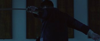 Movie still from “Kye Kye - Honest Affection” (2013), directed by Salomon Ligthelm – Medium shot, Low angle