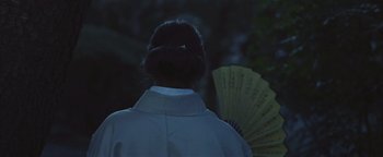 Movie still from “Kye Kye - Honest Affection” (2013), directed by Salomon Ligthelm – Close Up shot, Over the shoulder angle