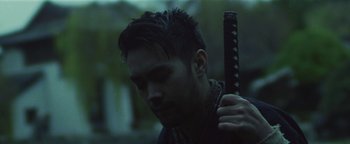 Movie still from “Kye Kye - Honest Affection” (2013), directed by Salomon Ligthelm – Close Up shot, Low angle