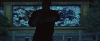 Movie still from “Kye Kye - Honest Affection” (2013), directed by Salomon Ligthelm – Medium shot, Low angle